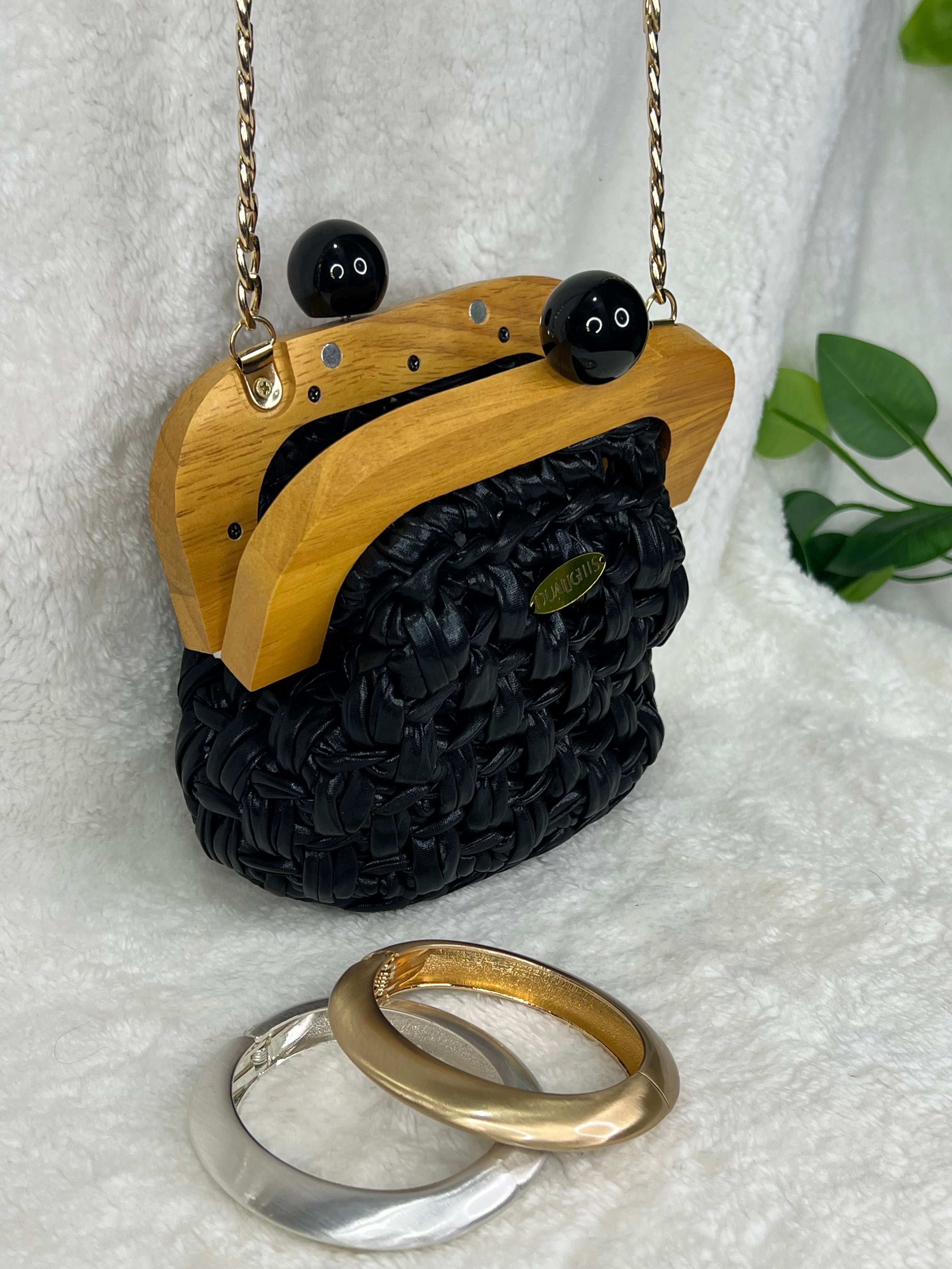 Metallic wooden frame clutch
