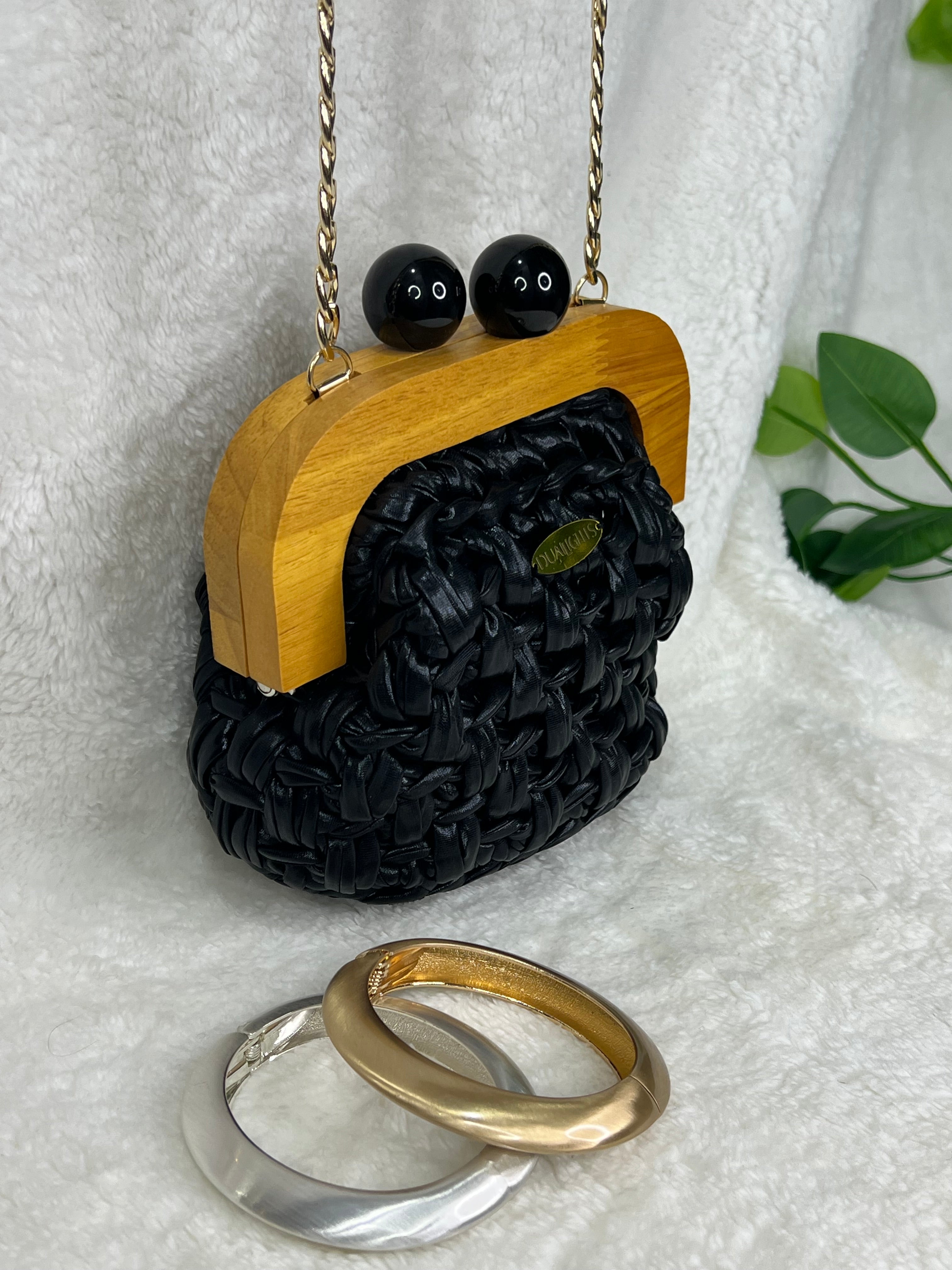 Metallic wooden frame clutch