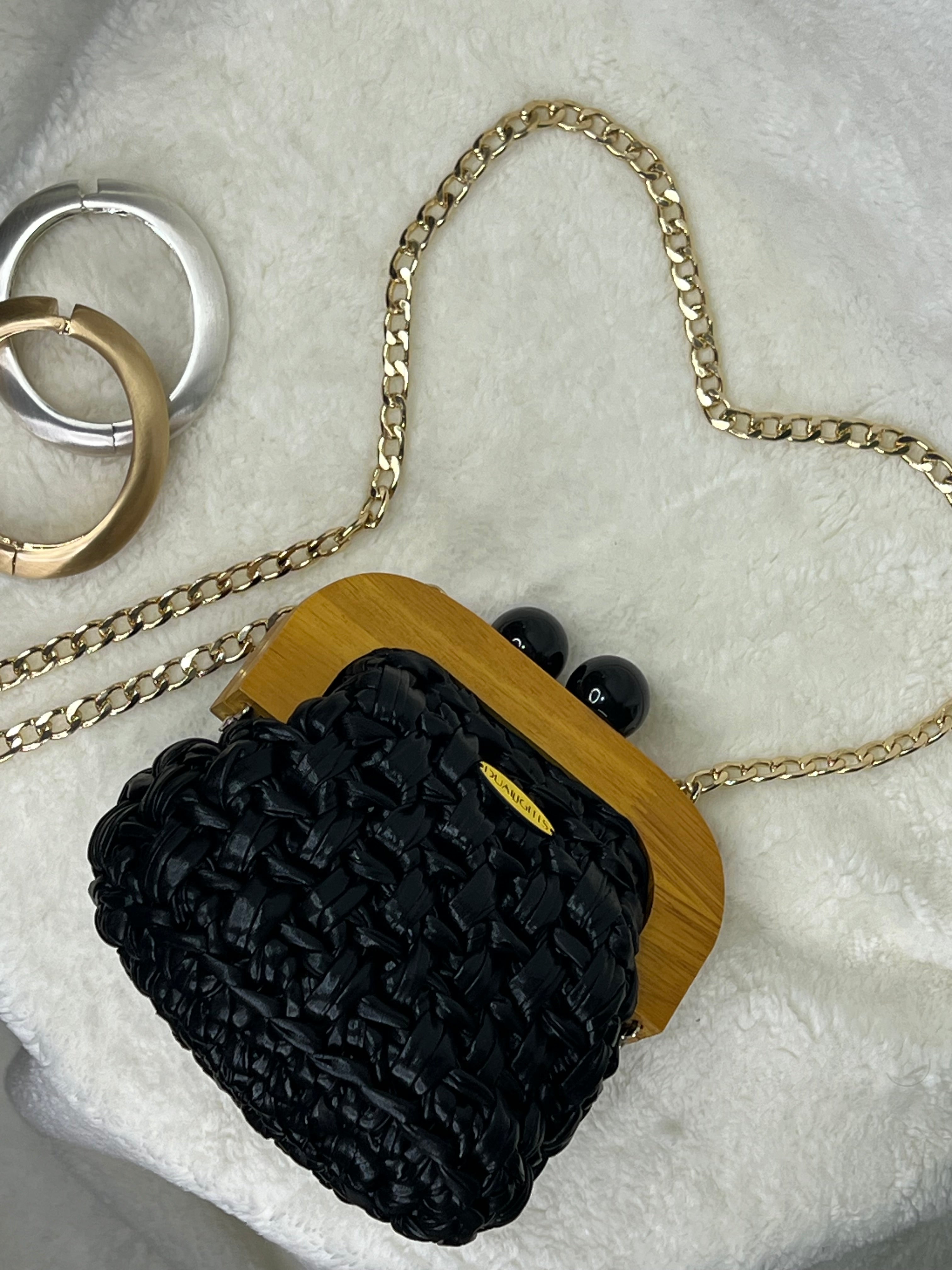 Metallic wooden frame clutch