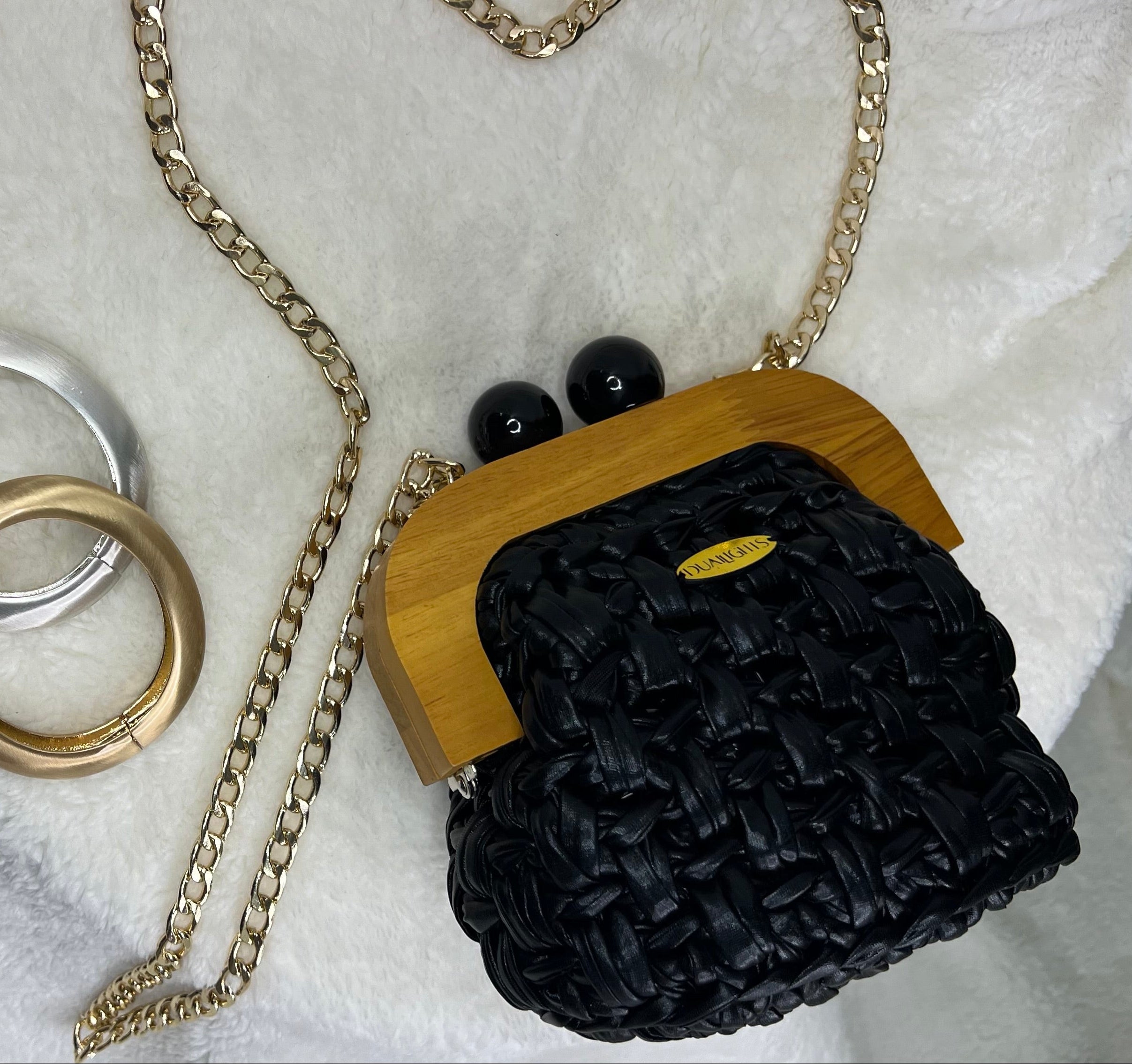 Metallic wooden frame clutch