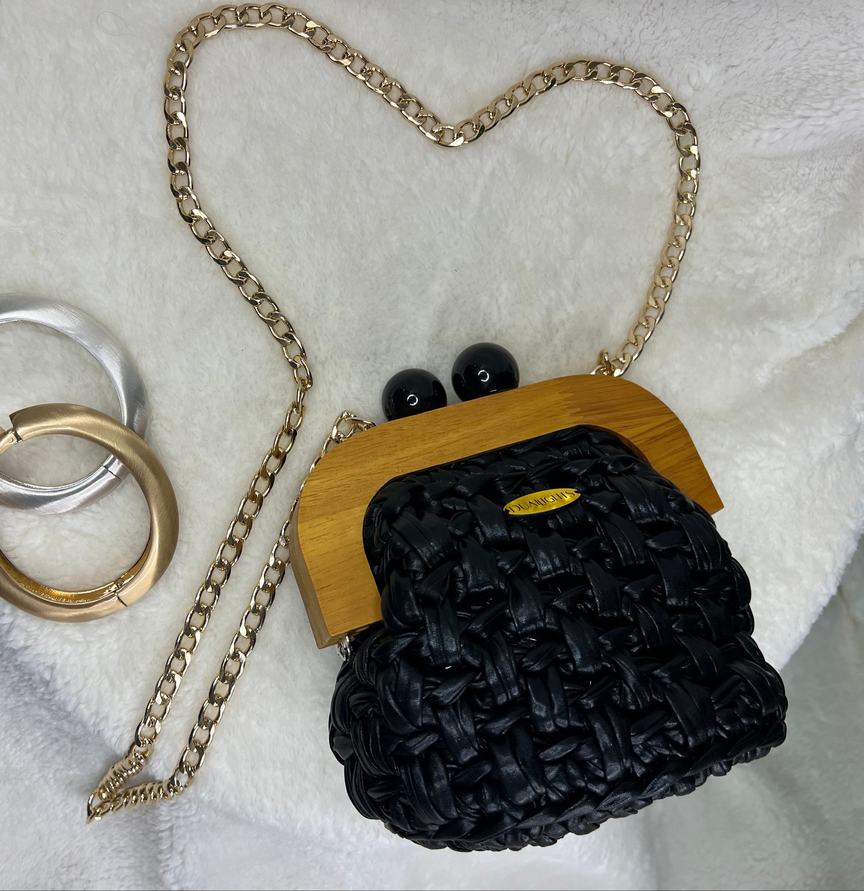 Metallic wooden frame clutch